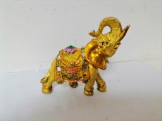 слон золото